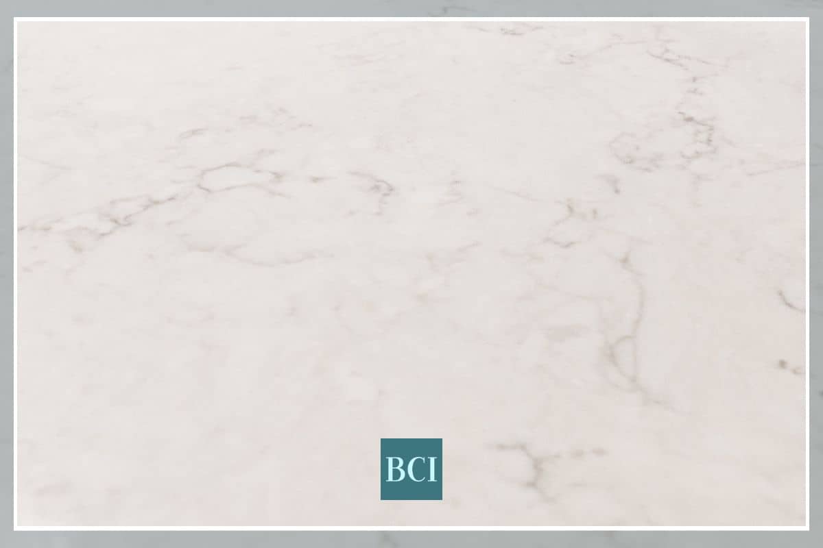 Photo image of light grey quartz countertop with veining. 